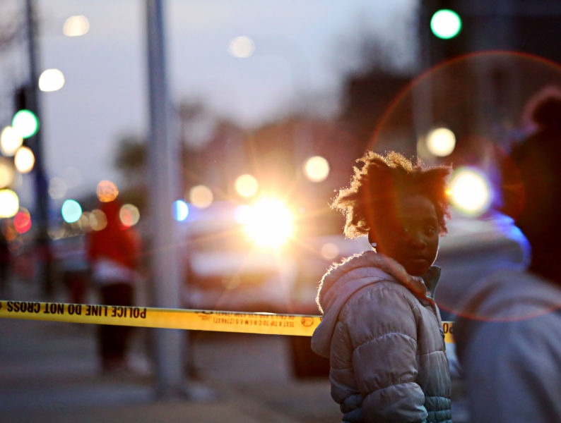 A young girl was walking home before coming across a crime scene where two people were shot at West 59th Street & South Morgan Street in Chicago on May 5, 2014.